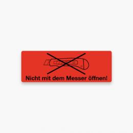 Nicht mit dem Messer ffnen!